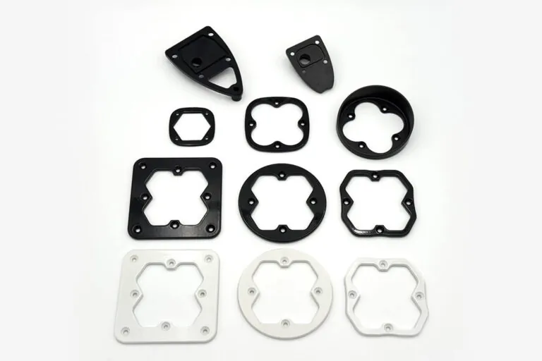 Professionally finished black aluminum die-cast enclosures showcasing high-quality surface coating and precise integrated mounting features.