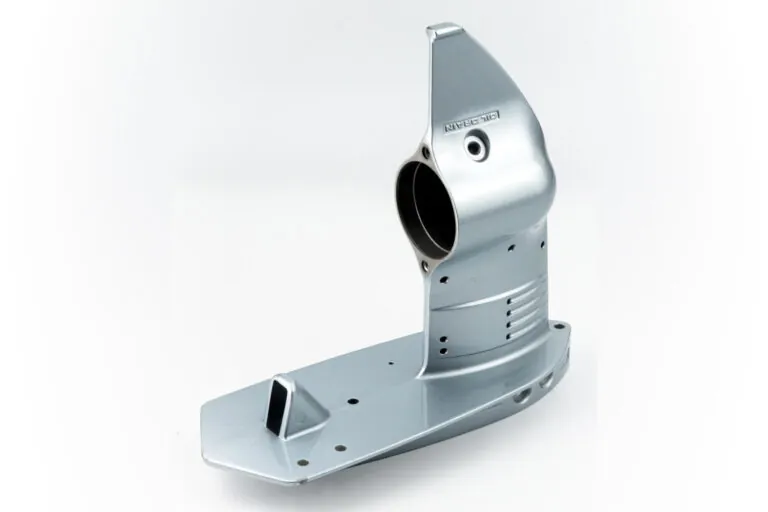 Silver liquid-coated aluminum die cast marine part featuring custom color matching and 100% salt spray test verification