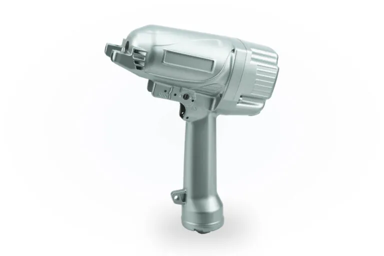 High-precision silver liquid-coated aluminum die cast housing for a professional-grade pneumatic impact wrench.